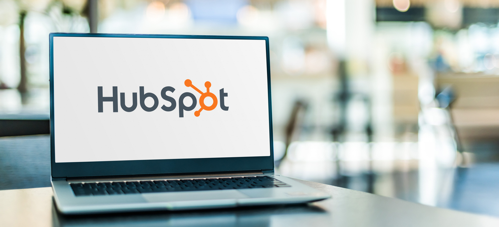 The HubSpot logo on a laptop