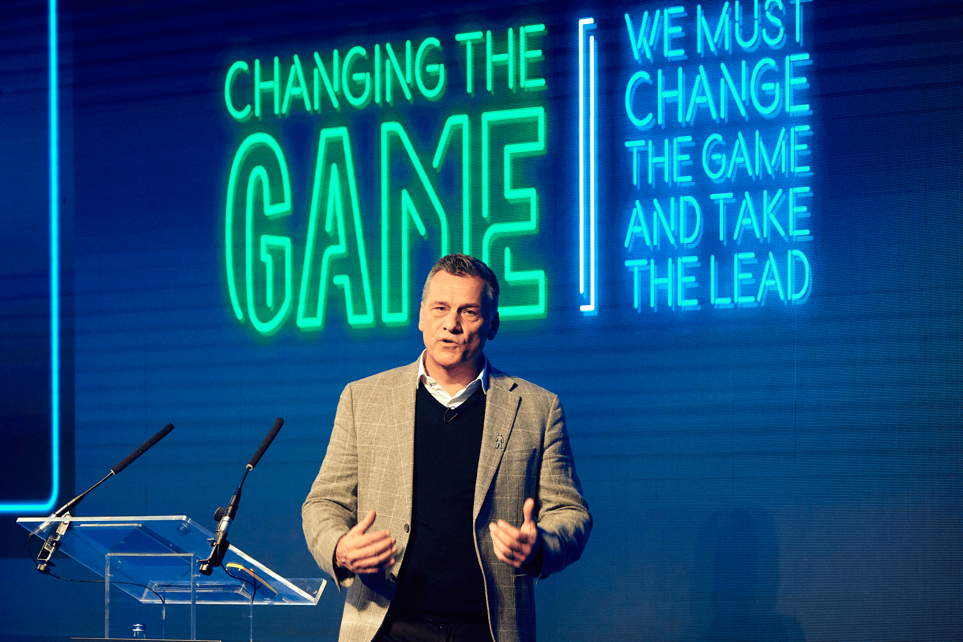 A man speaking at Keyline's corporate event
